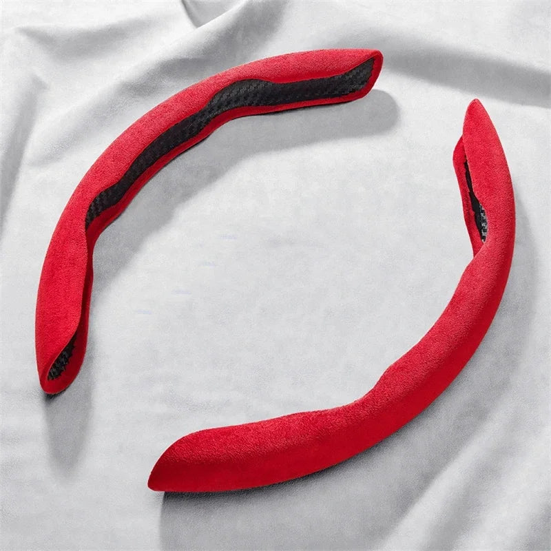 Suede Car Steering Wheel Cover in red, two-piece non-slip grip protector on a light fabric background