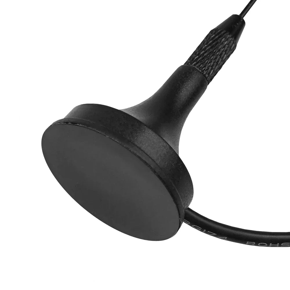 Close-up of the antenna's magnetic mounting base and knurled cable connector