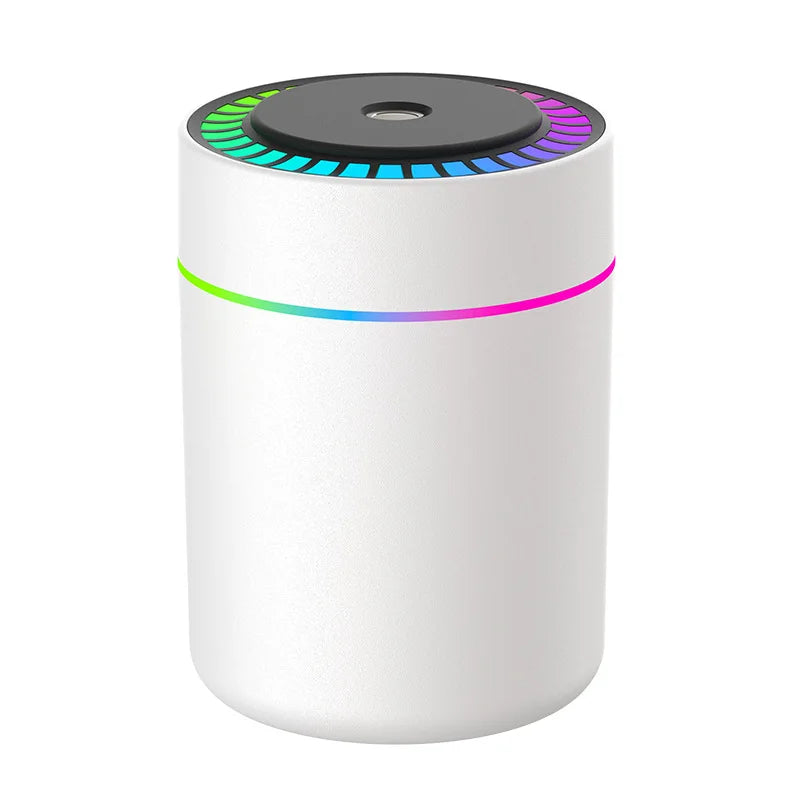 White cylindrical car aroma diffuser with rainbow LED ring light, product-only shot on white background