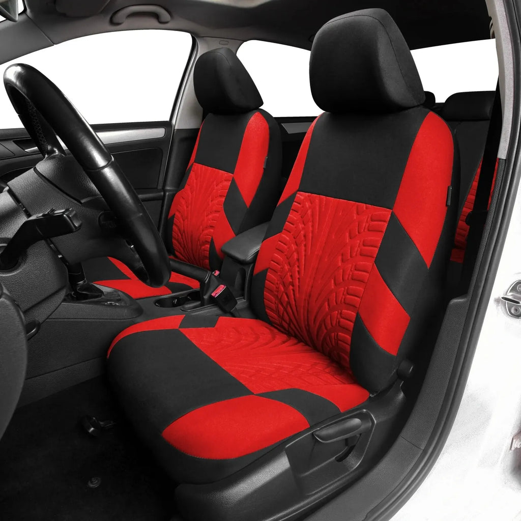 Crimson red and black universal car seat covers installed on the front seats of a real car interior.