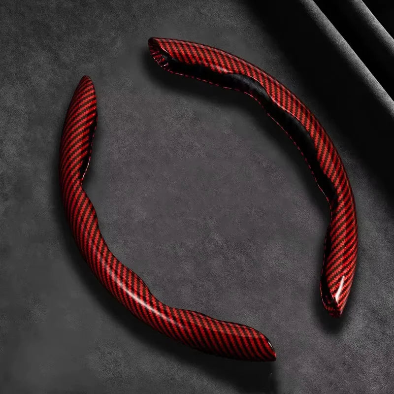 Red Carbon Fibre Wheel Cover open ring detail on dark background