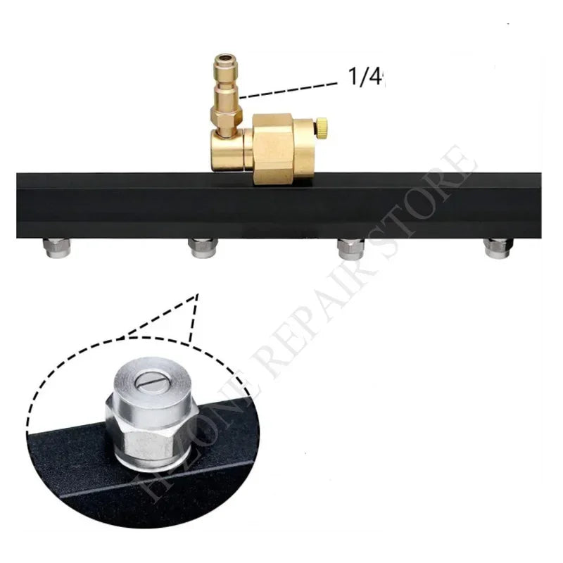 Close-up of the underbody washer wand's 1/4 inch brass quick-connect fitting and wheel axle bolt