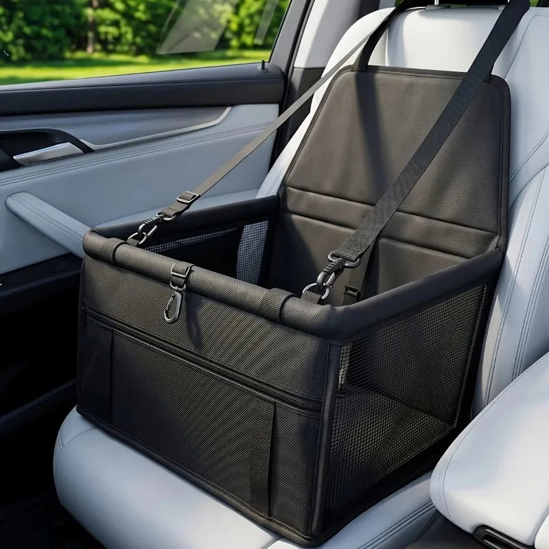 Black Mesh Pet Booster Seat strapped to a grey car front seat with headrest strap and safety leash clips