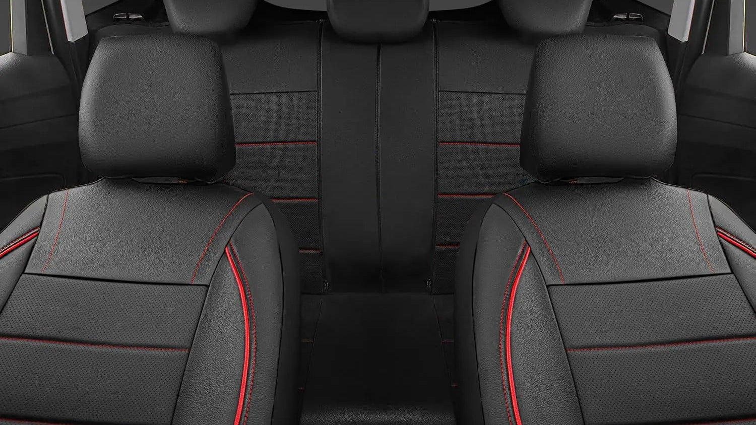 Black car interior with red stitching on the seats
