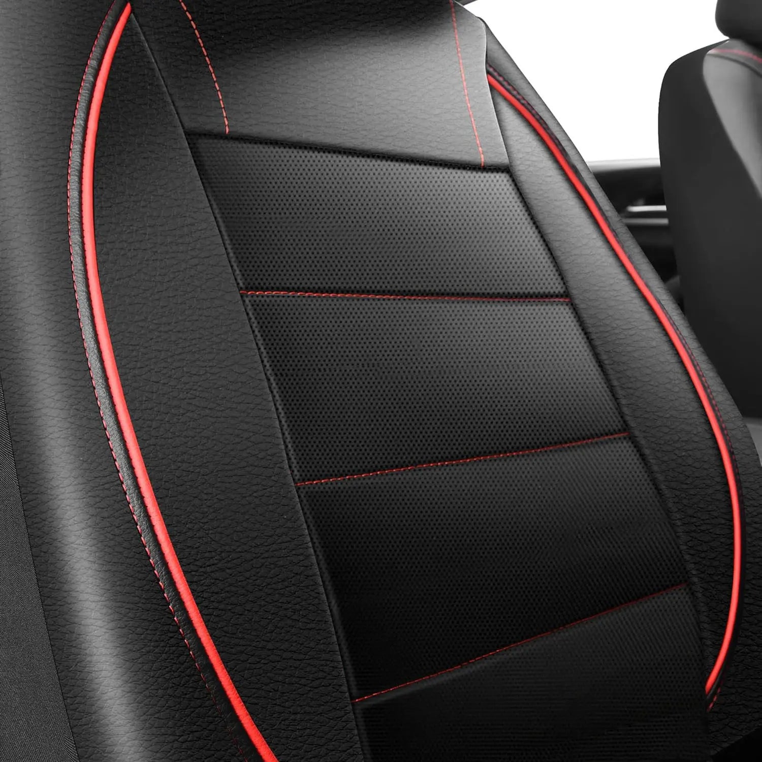 Close up of Leather Car Seat Covers perforated breathable leather texture with red stitching
