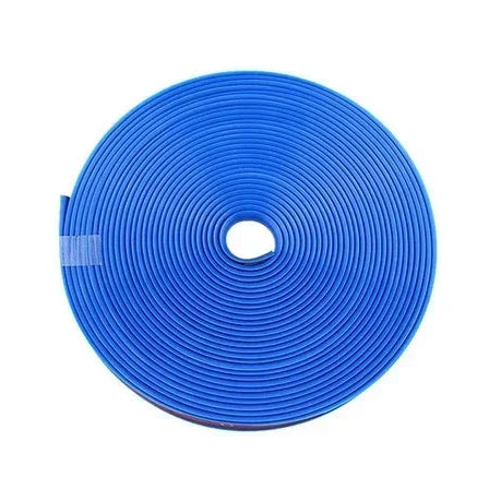Coiled blue rubber wheel rim protector strip roll photographed on a white background