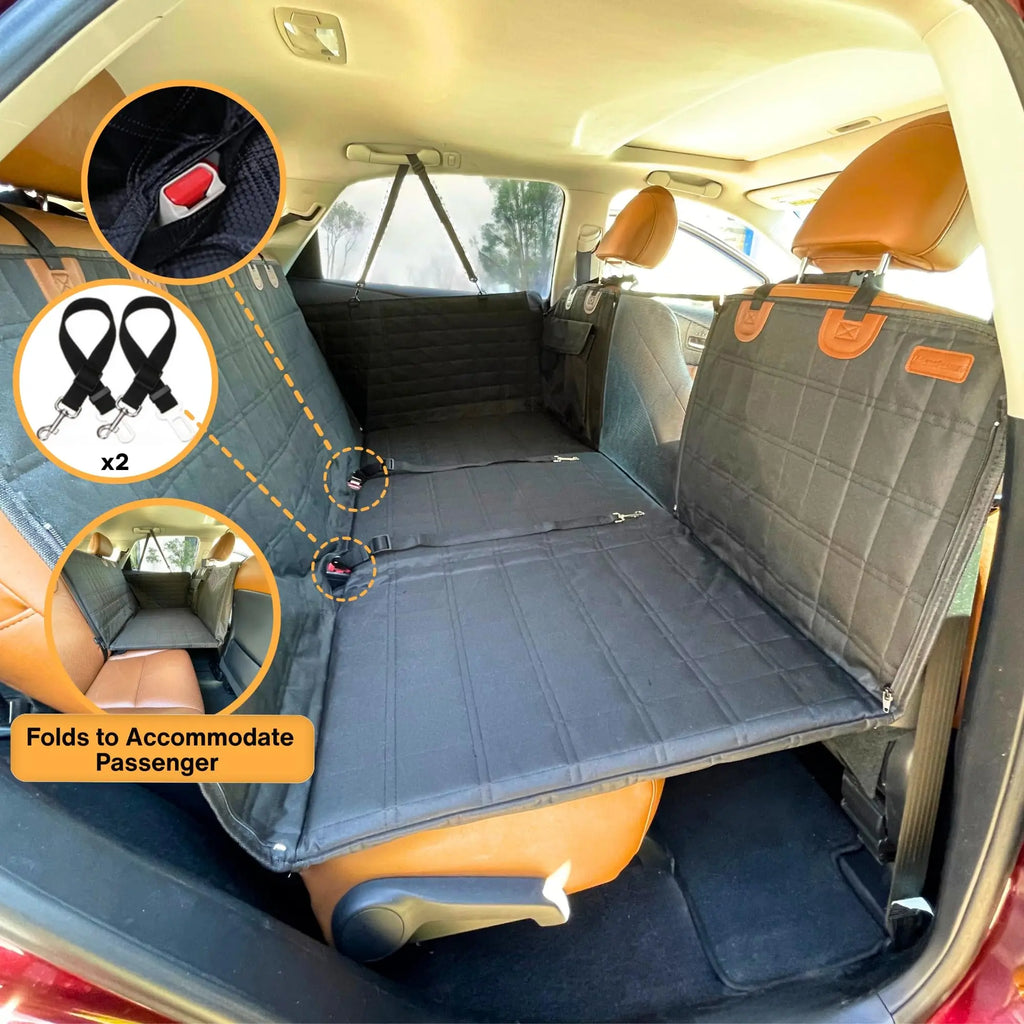 Hard-Base Dog Seat Extender in black fitted in a car, with inset images of seat belt clips and the section that folds to fit a passenger
