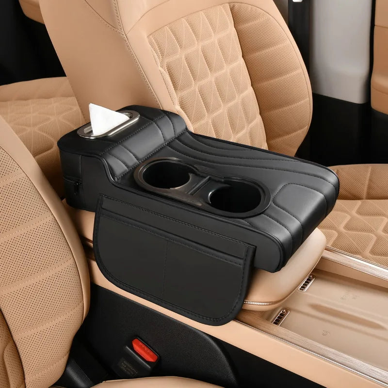 Black Multi-Function Car Armrest Organiser installed between beige leather car seats with tissue dispenser in use