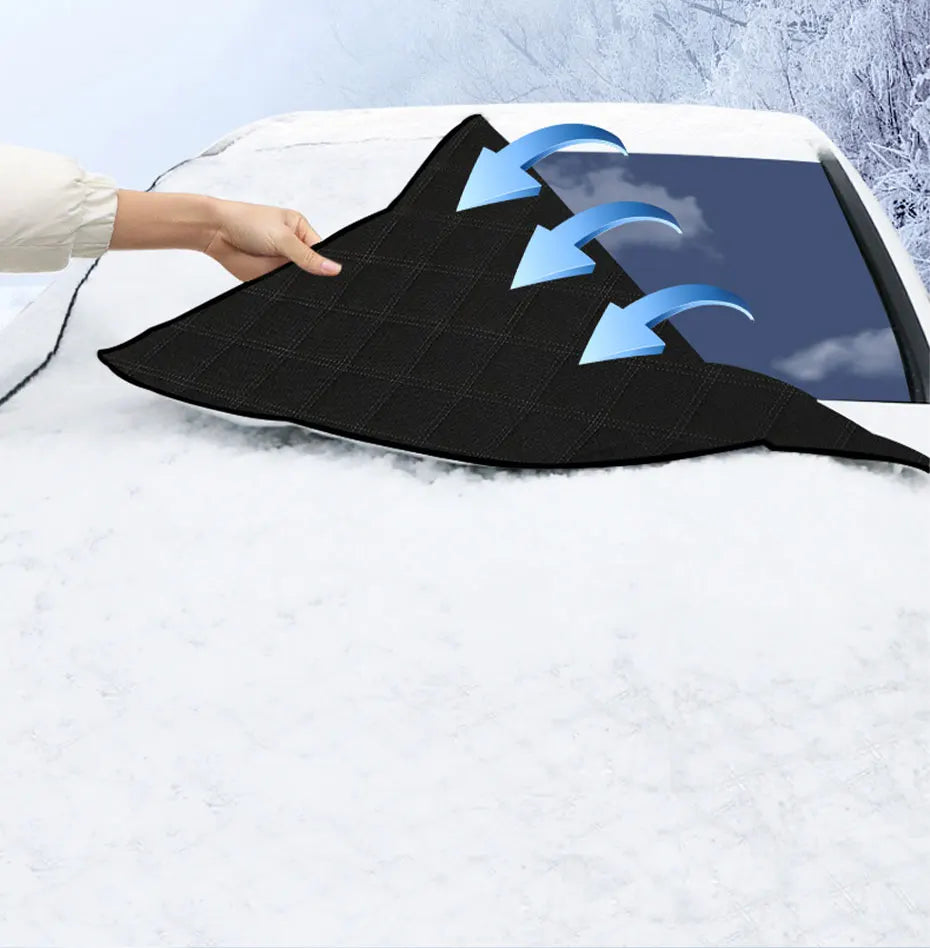 Quilted Half Car Cover black underside being laid over a snow-covered windscreen