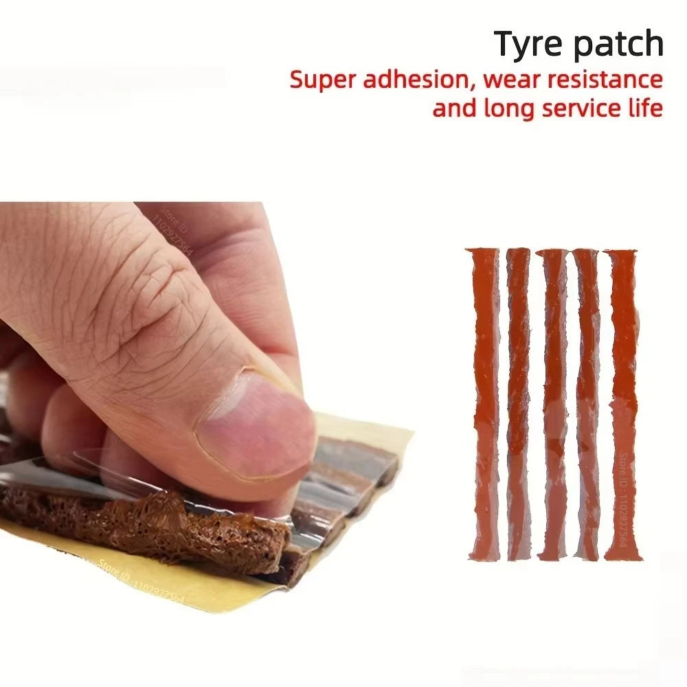 Close-up of a rubber tyre patch strip being inserted by hand alongside spare repair strips from the Tyre Repair Tool Kit