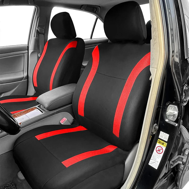 Black and red trim Breathable Mesh Seat Cover installed on car front seats viewed through open door with dashboard and steering wheel visible