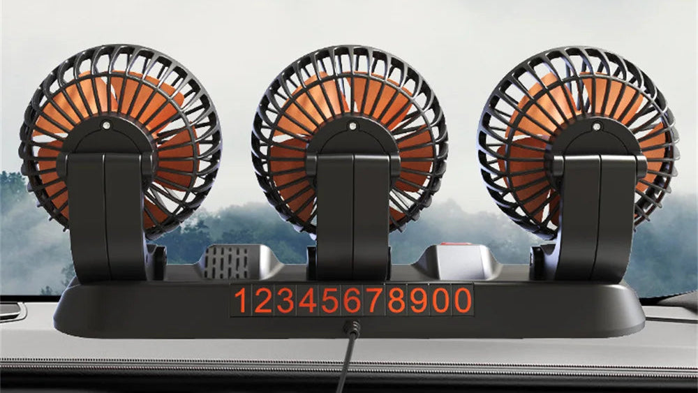 Three portable fans on a car dashboard with digital display