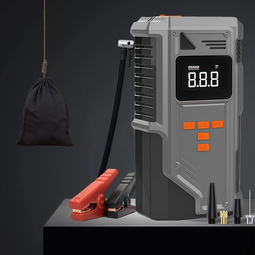 Heavy-Duty Car Jump Starter with jump start clamps, carry bag and inflator nozzle accessories on a dark background