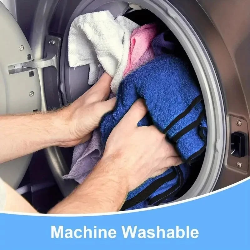 Hand pulling a blue microfibre towel from a car door side pocket