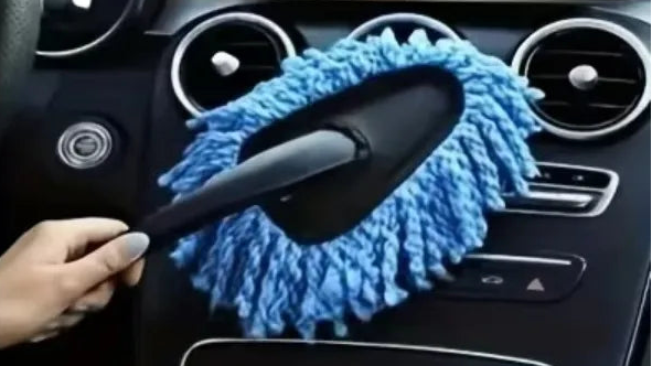 A four-panel collage showing a blue microfiber car interior cleaner being used to wipe a windshield, car door, steering wheel, and dashboard. Large text at the top reads, 'It has wide applications and is convenient to carry.
