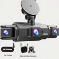 Quad-Lens Dash Cam with windscreen mount, car charger cable and external rear camera accessories laid out beside the unit