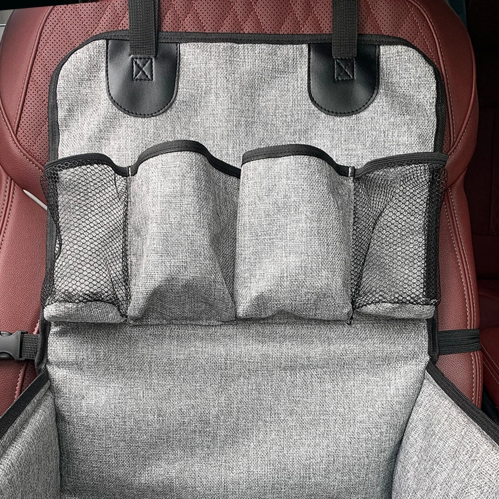 Close-up of the multiple storage pockets on the foldable dog car booster seat, designed for treats, toys and pet essentials.