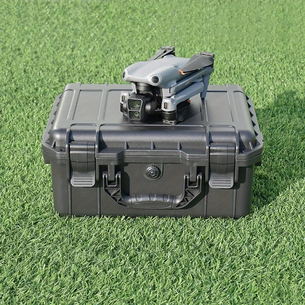 All-Weather Storage Case sitting on grass outdoors with a drone resting on the lid
