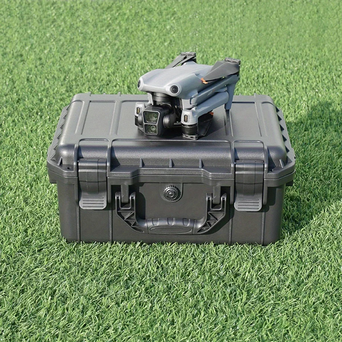 All-Weather Storage Case sitting on grass outdoors with a drone resting on the lid