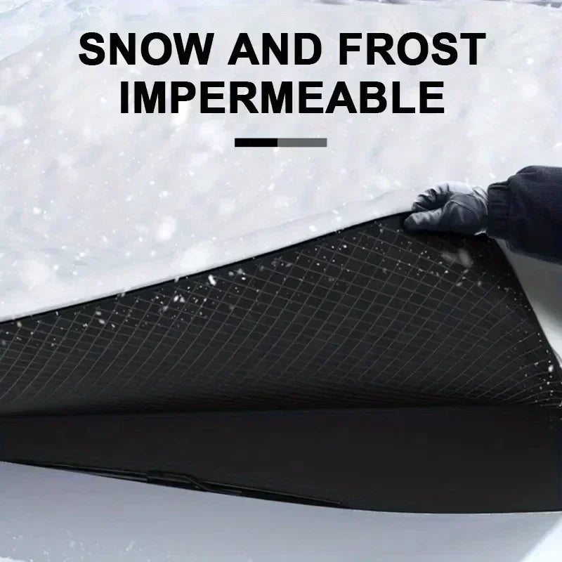 Hand lifting the Magnetic Windscreen Frost Cover off a windscreen to reveal it is snow and frost impermeable