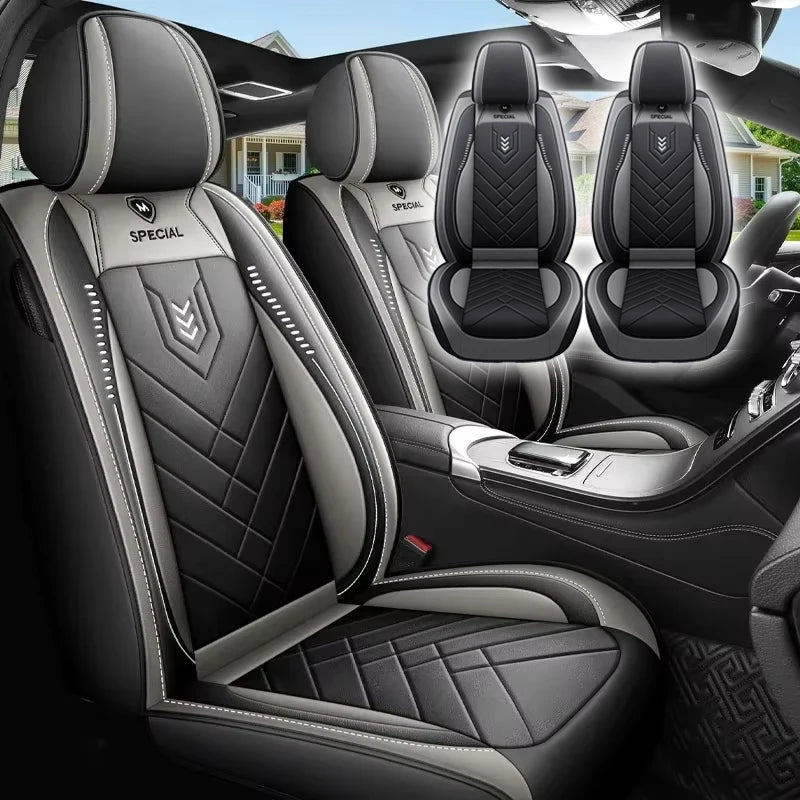 Grey Leather-Look Front Pair Car Seat Covers fitted in a vehicle interior