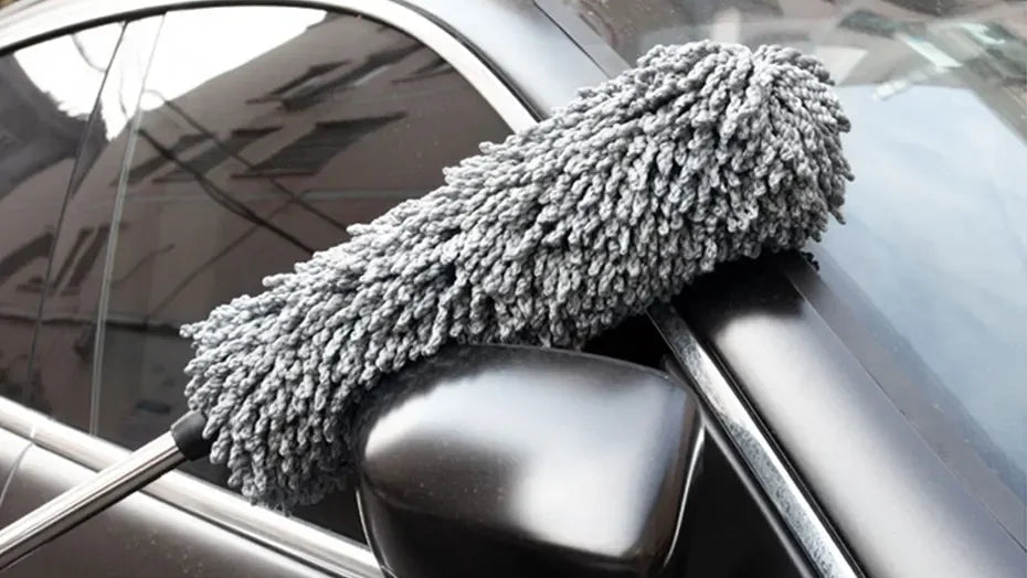 Car cleaning tool with a 360-degree dust removal feature, used on car mirrors and wheels.