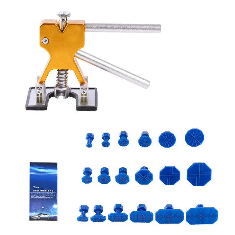Paintless Dent Repair Kit with gold-tone suction cup dent puller tool, eighteen assorted glue tabs and instruction booklet on a white background.
