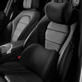 Memory Foam Car Headrest Neck Pillow and Lumbar Support Cushion installed on a black leather car seat for ergonomic neck and back support