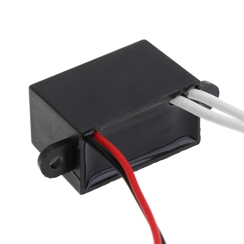 Close-up of the negative ion generator control box housing with red and black input wires for the compact car air ionizer