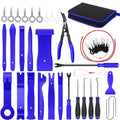 Blue interior trim removal tool kit and panel clip door card pry bar set arranged in rows next to its zippered carry case.