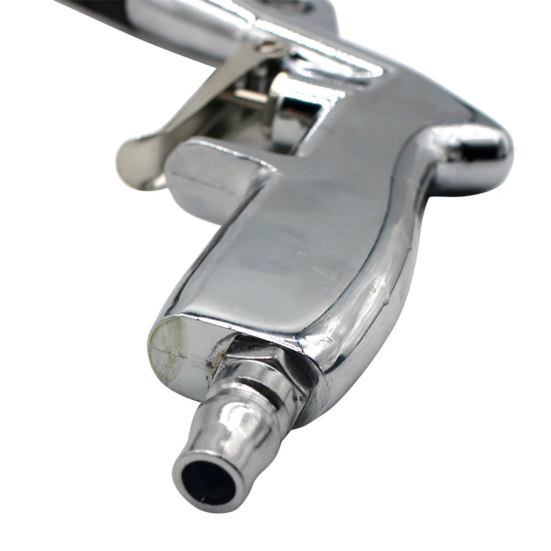 Close-up of the air blow dust gun's chrome trigger mechanism and air inlet connector