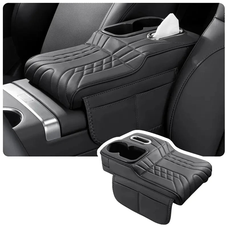 Black multifunctional car armrest cushion protector with built-in drink holder and tissue slot, shown installed on a vehicle centre console and isolated on a white background.