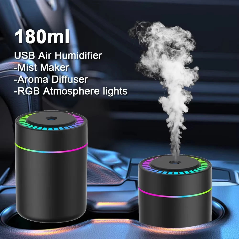 Black and white car aroma diffusers emitting mist in a car cup holder and console, 180ml USB air humidifier