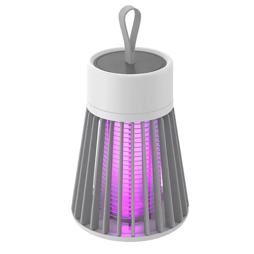 Cordless Insect Zapper in grey and white with a glowing purple UV light and top hanging loop on a white background