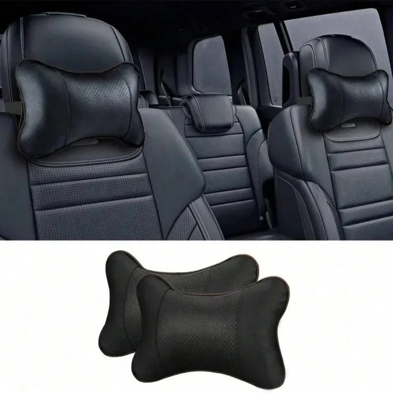 Two breathable neck support cushions fitted to rear passenger seat headrests