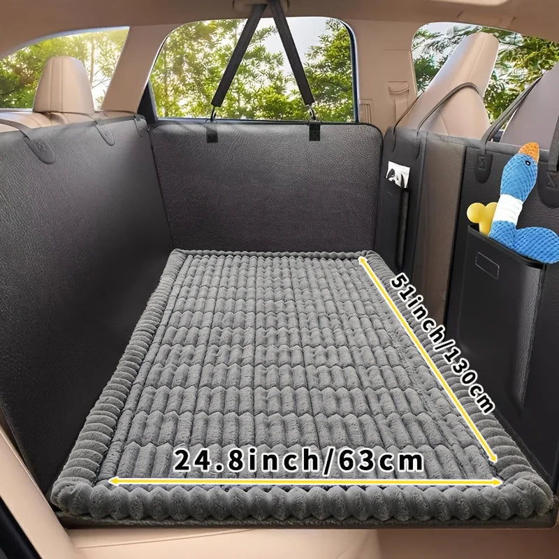 Grey Plush Pet Car Cushion in a car boot with dimension labels showing 130cm by 63cm for sizing reference
