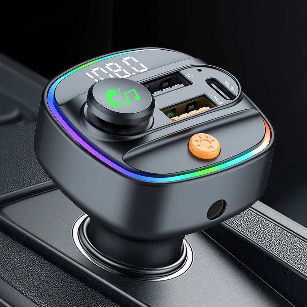 Bluetooth Car FM Transmitter and hands-free MP3 adapter shown plugged into a car charging port on a plain background.