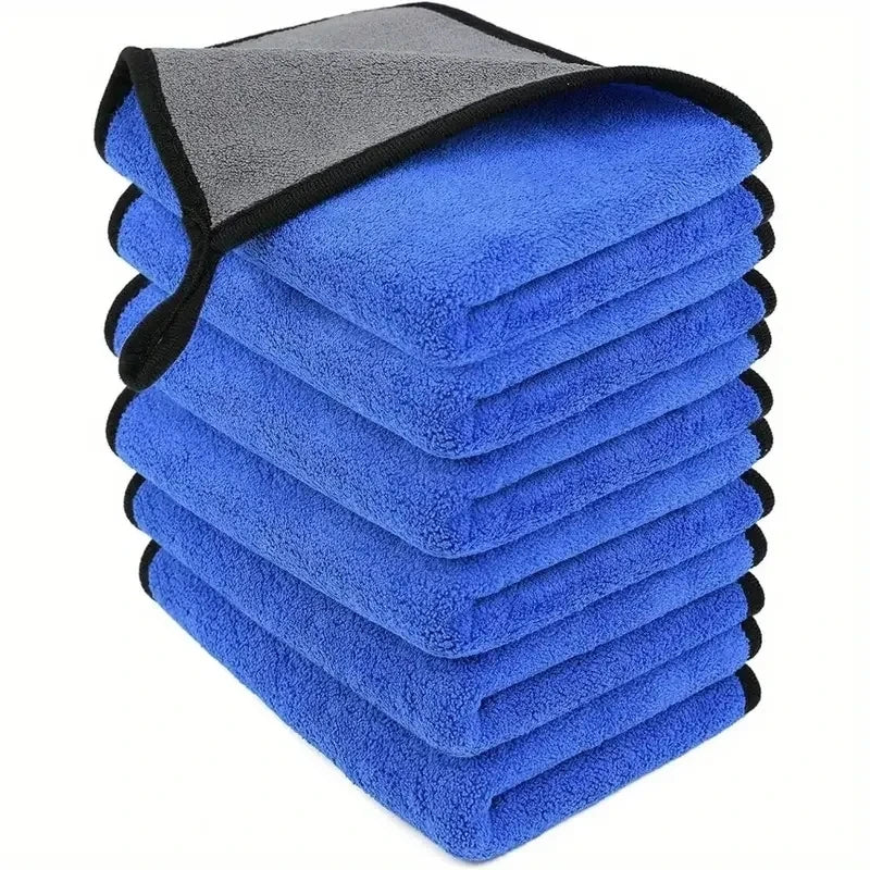 Stack of six premium 800GSM microfibre car wash towels in blue and grey on a white background