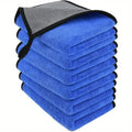 Stack of six premium 800GSM microfibre car wash towels in blue and grey on a white background