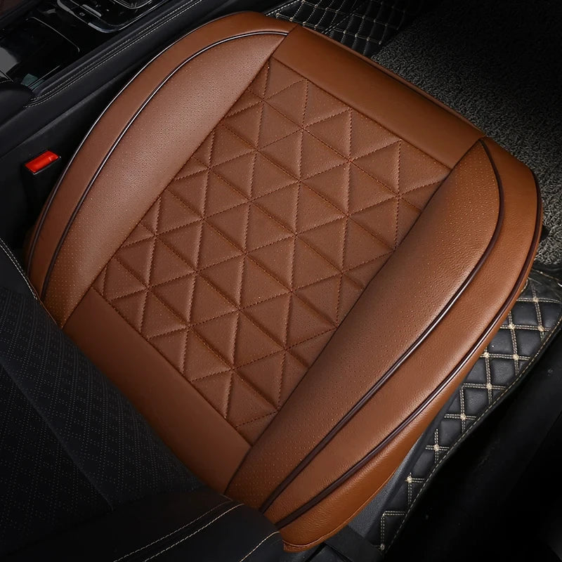 Front Seat Cushion Cover in brown fitted to a car seat, close-up angled view