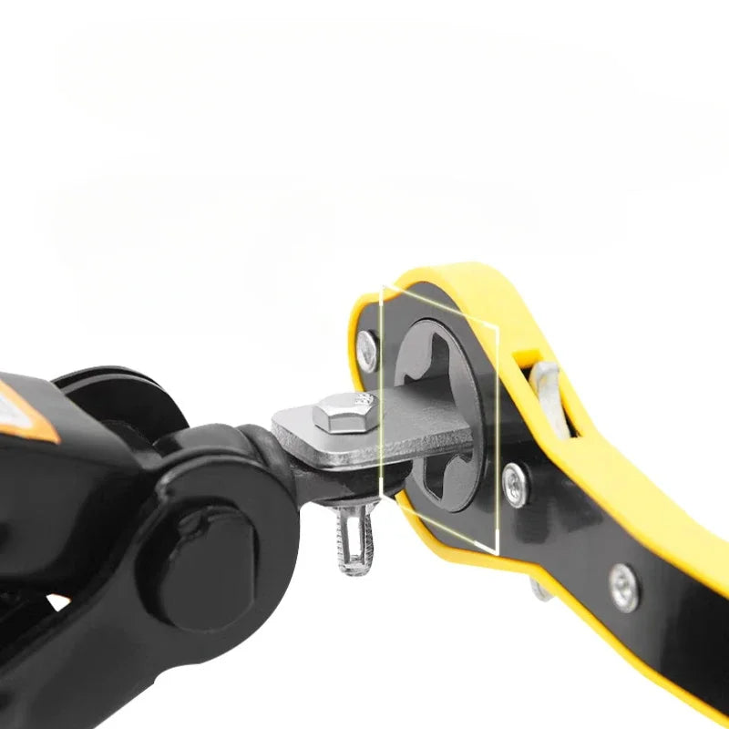 Close-up of a ratchet wrench socket head engaging a car scissor jack screw mechanism