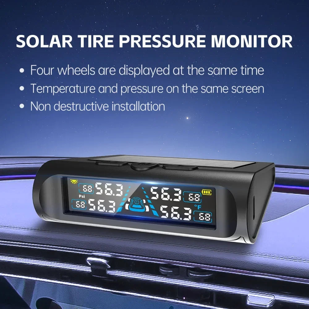Solar tyre pressure monitor on a car dashboard displaying pressure and temperature for all four tyres