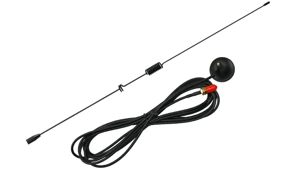 A black whip antenna with a long wire, spring section, and flat round magnetic base, shown on a plain white background.