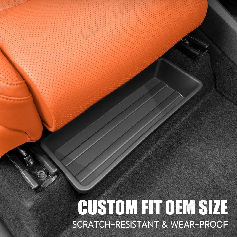 Custom Fit OEM Size, Scratch-Resistant and Wear-Proof text over the storage drawer fitted under an orange car seat