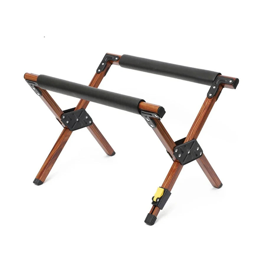 Wood-grain folding X-frame cooler stand with padded crossbars, shown assembled on white background