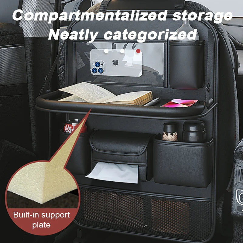 PU Leather Car Backseat Organiser mounted on a headrest holding a phone, book and tissue box for compartmentalised storage