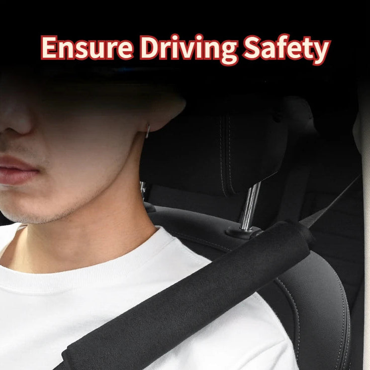 Man wearing a black seat belt shoulder cover over a white t-shirt with ensure driving safety text overlay