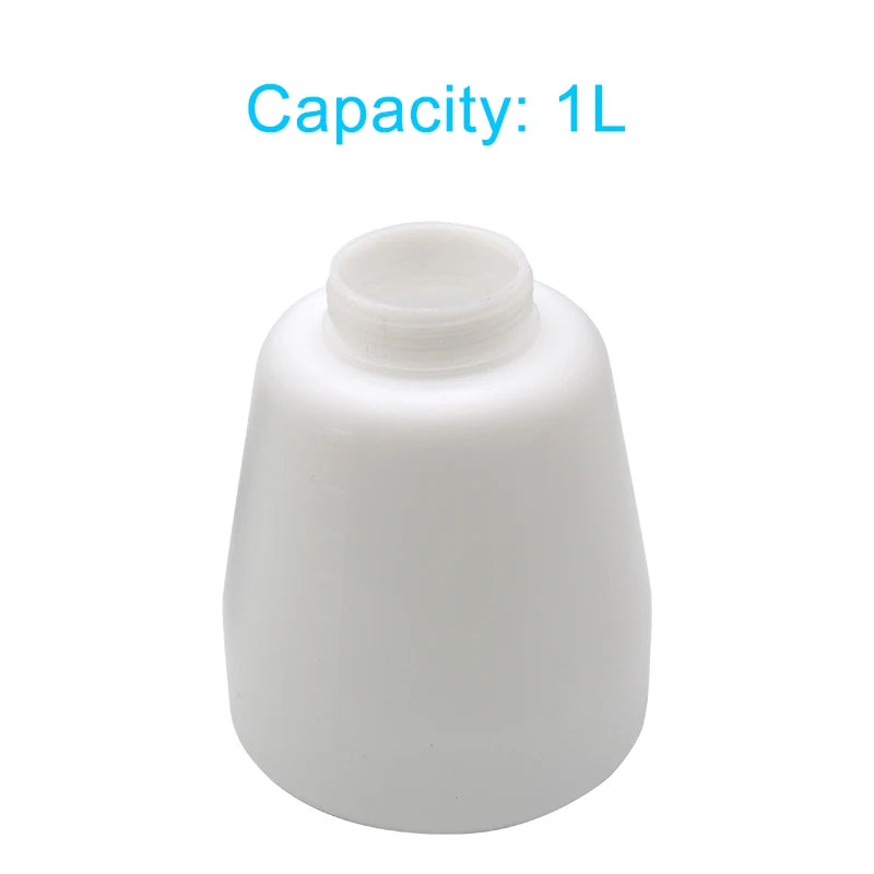 Close-up of the pneumatic detail cleaning gun's white 1 litre capacity fluid bottle