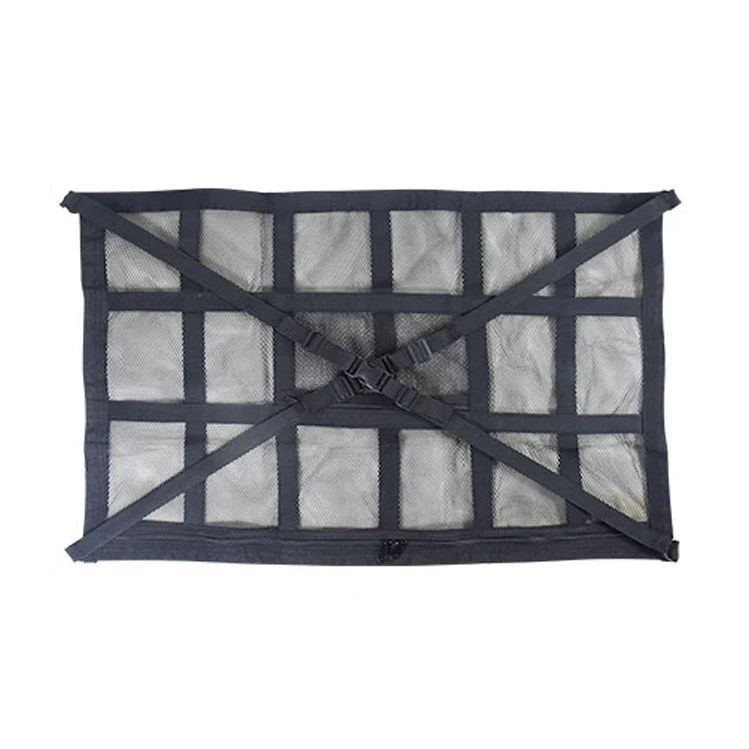 Black mesh car roof cargo net on clean white background