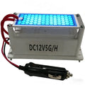 Compact 12V Ozone Generator 5 g/h with blue ceramic ozone plate and cigarette lighter plug on white background